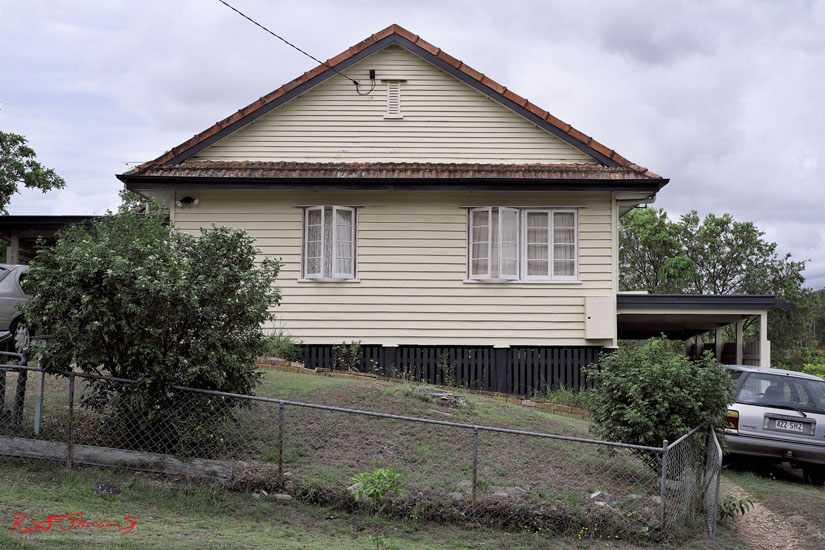 Traditional 40's 50's weatherboard home with casement windows on a sloping block in Carina. Post WW2 Brisbane vernacular architecture.