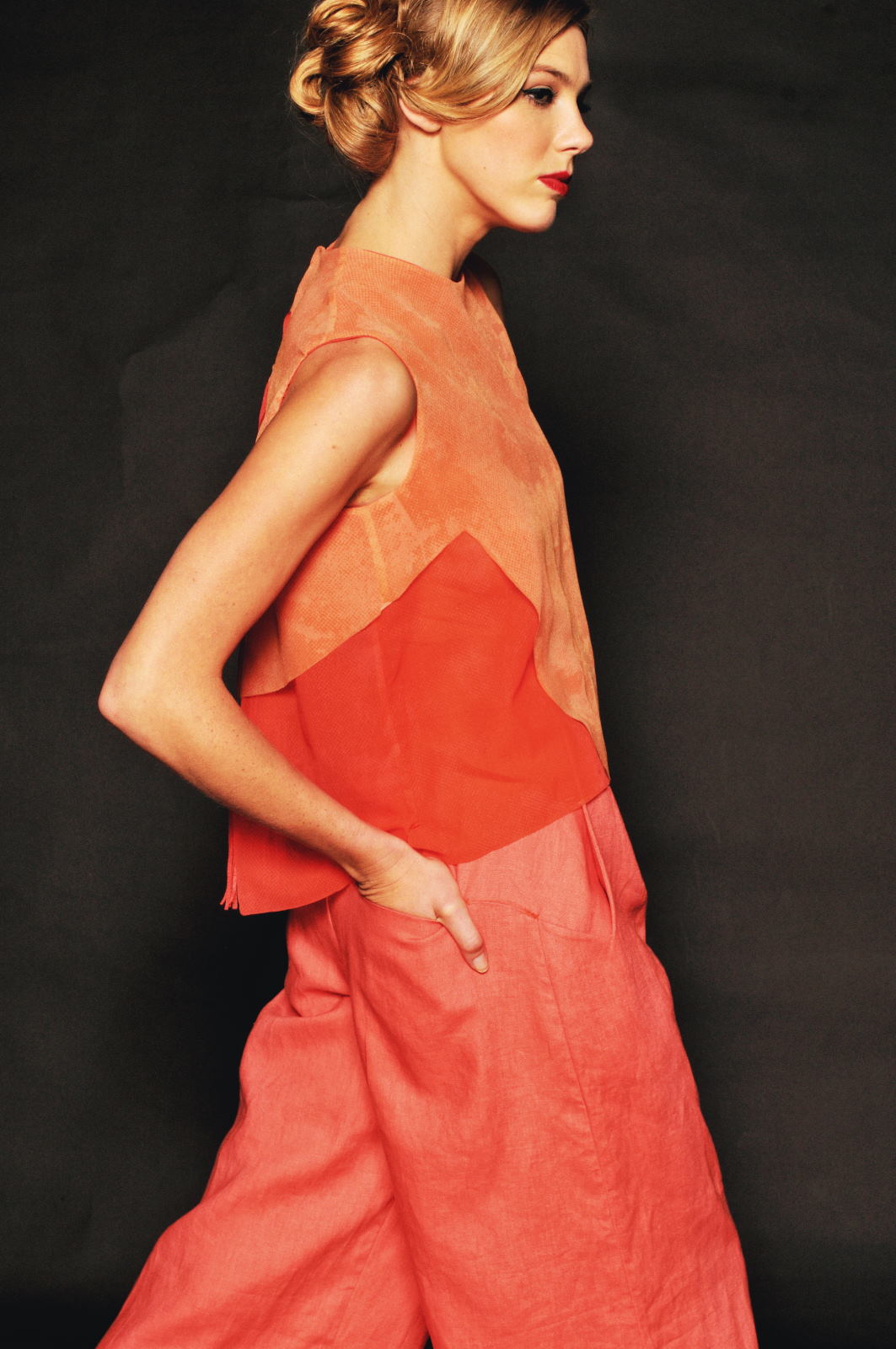 Sydney Fashion Photography by Kent Johnson, baggy orange calotts matching top.