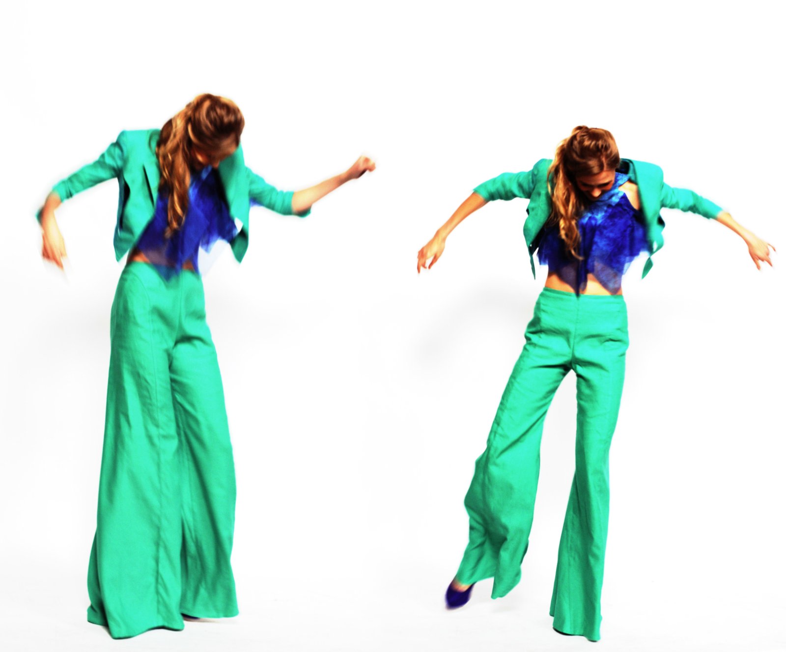 Jumping and spinning, Couture Studio Shoot, green pants suit from behind. Photography by Kent Johnson.