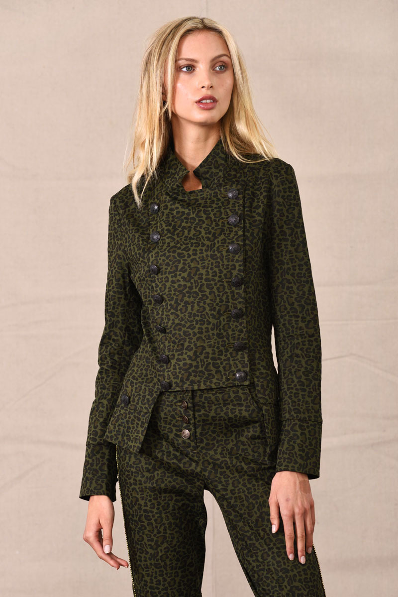 Mid shot of green animal print millitary jacket and pants - eCommerce Studio Fashion Photography by Kent Johnson. Fashion marketing campaign, model on canvas background.