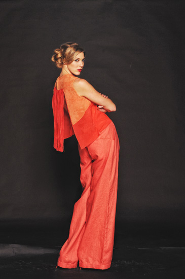 Couture Studio Shoot, Modelling Orange Fashion, jacket with fringed open back, baggy pants. Sydney Fashion Photography.