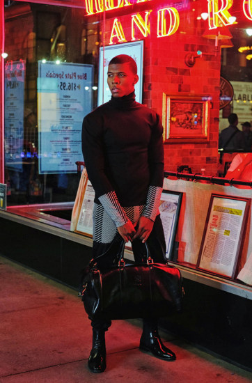 In a wash of red neon light under the Empire State - Menswear photographed in New York City.