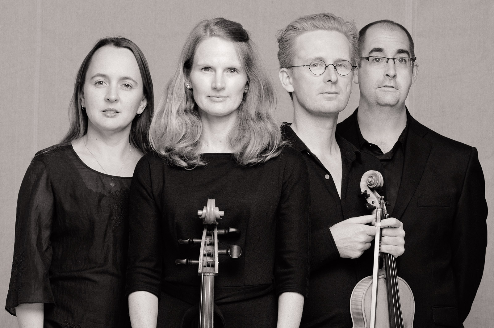 Marketing and promotional portrait for a classical music string quartet. Studio Photography by Kent Johnson.