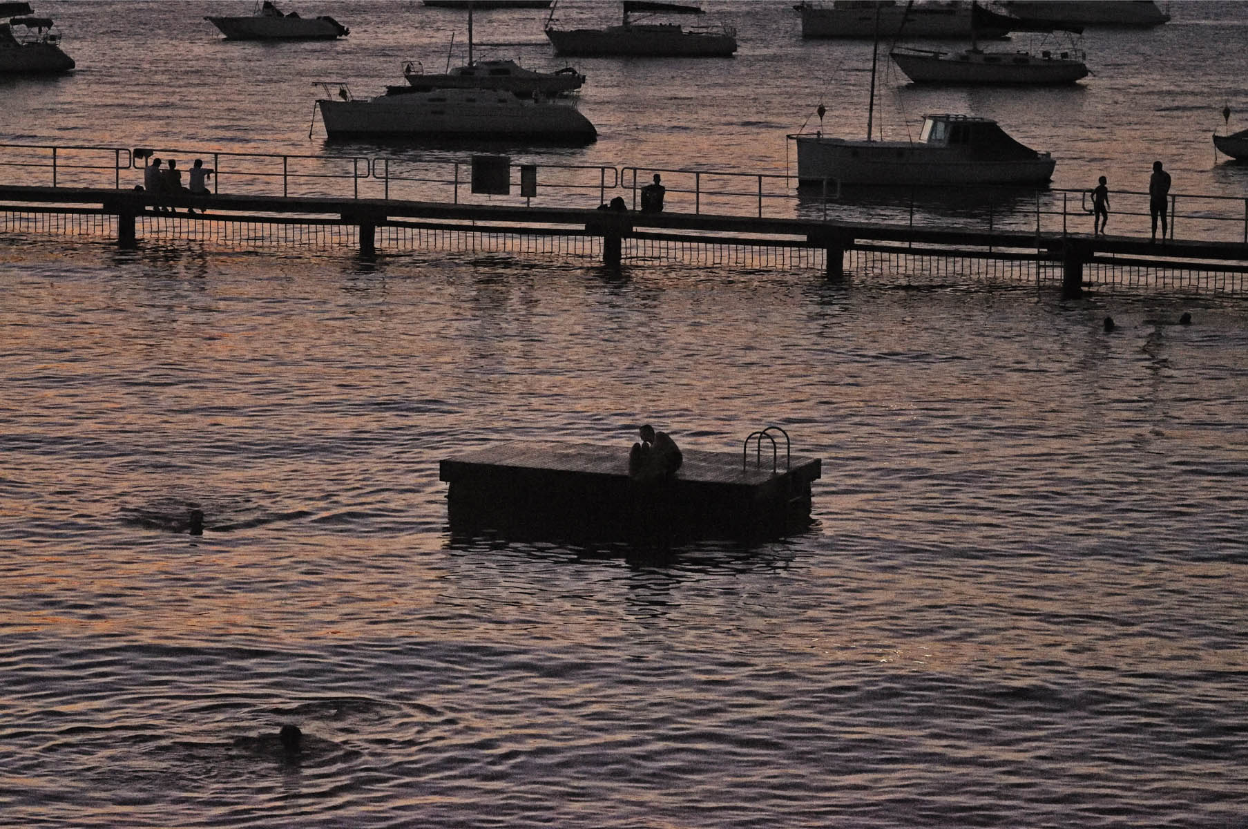 Silhouette swimmers - Redleaf Boulevardier, Impressions of Redleaf Sydney an exhibition of photographs by Kent Johnson