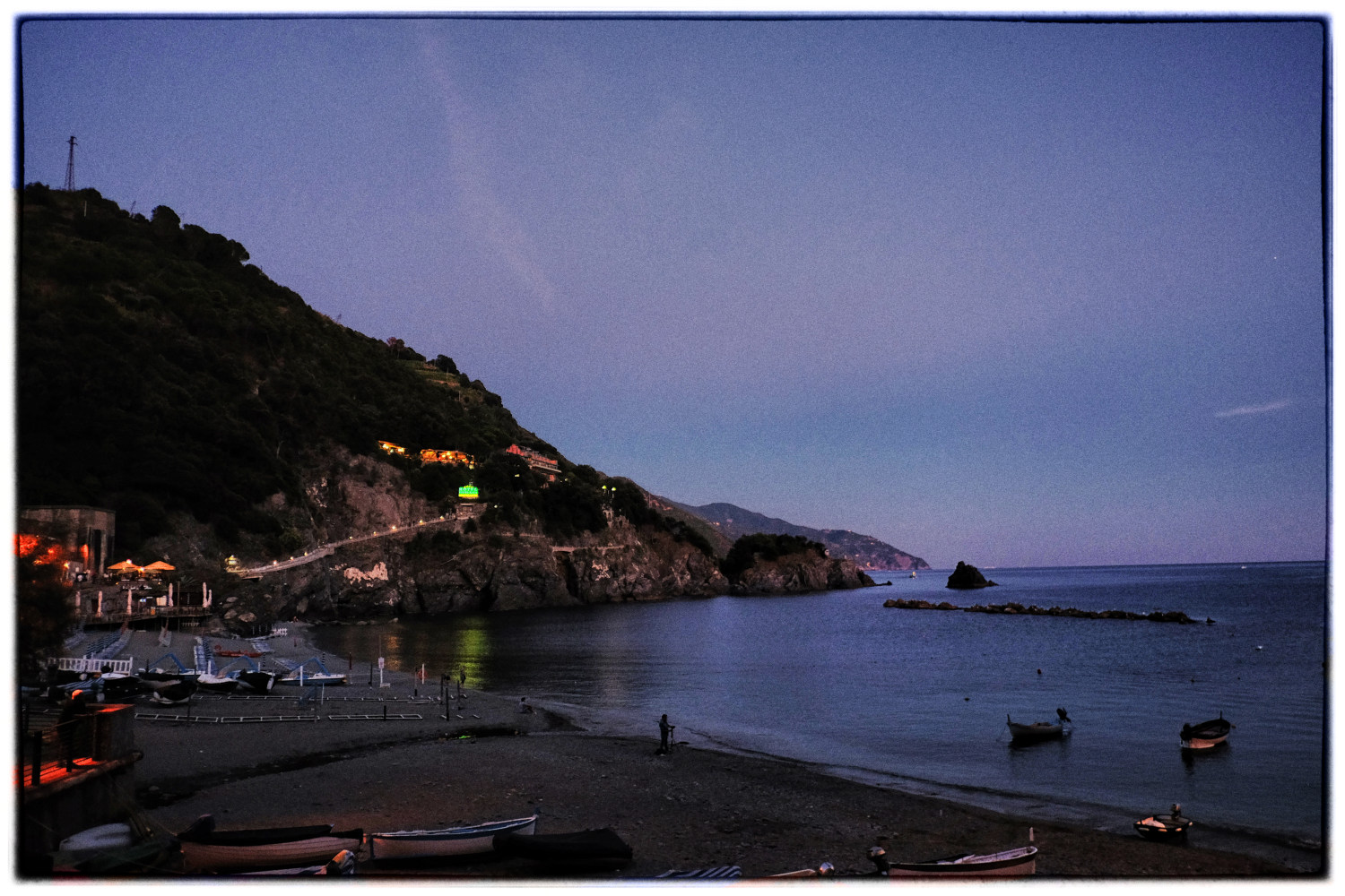 A view of Cinque Terre in the evening from Monterosso al Mare SP, Italy. Food and travel photography by Kent Johnson
