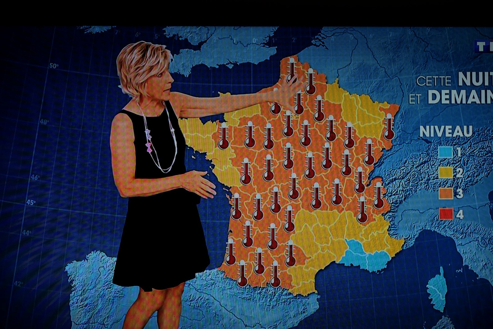 A very hot summer - TV weather report from Paris France. Photography by Kent Johnson.
