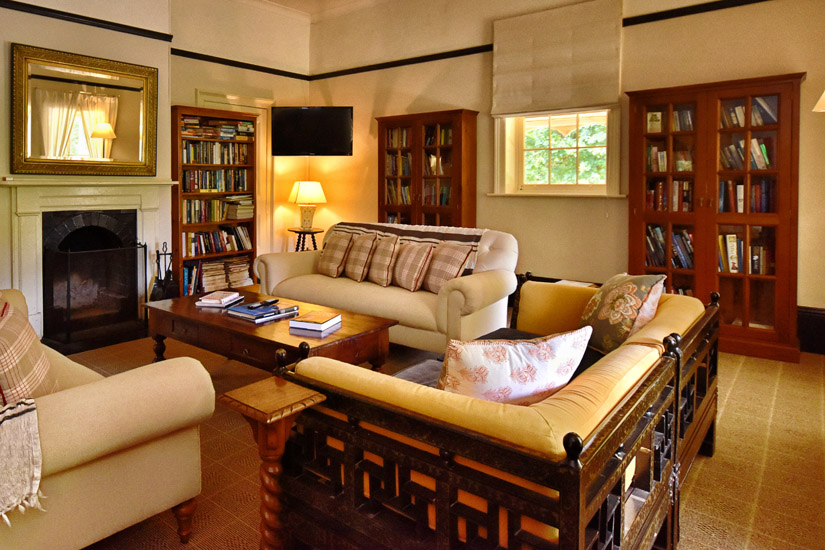 The library, one of many common area rooms at the historic Fitzroy Inn, Mittagong in the Southern Highlands. Hotel interior photography by Kent Johnson.