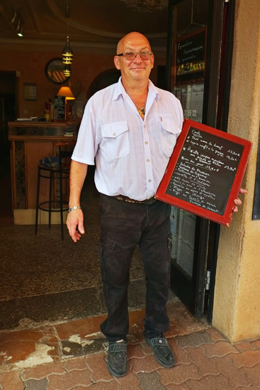 Portrait of chef Michel Herbet at his bar-restaurant-pizzeria Le Petit BAGNOLAIS. Lifestyle travel and people photography by Kent Johnson.