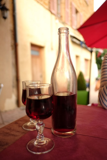 Local Beaujolais wine at the local restaurant in Bagnols. Food, wine and travel photography by Kent Johnson.