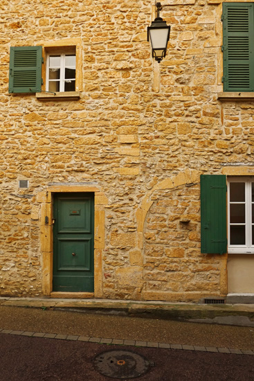 A classic Golden Stone house in Le Bois-d'Oingt. Architectural travel photography by Kent Johnson.
