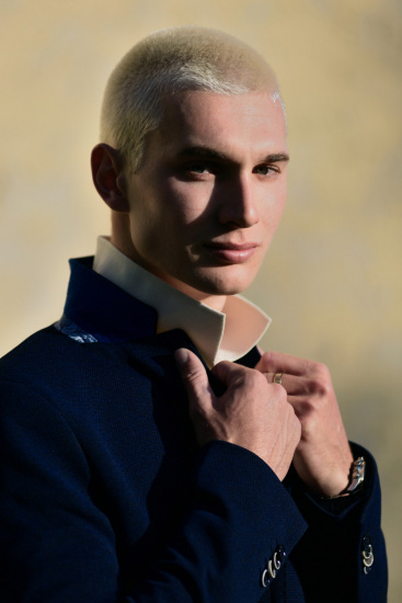 Laidley, head shot with jacket collar up, on location, Sydney, Australia.