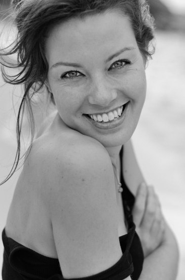 Model on beach with a beautiful smile