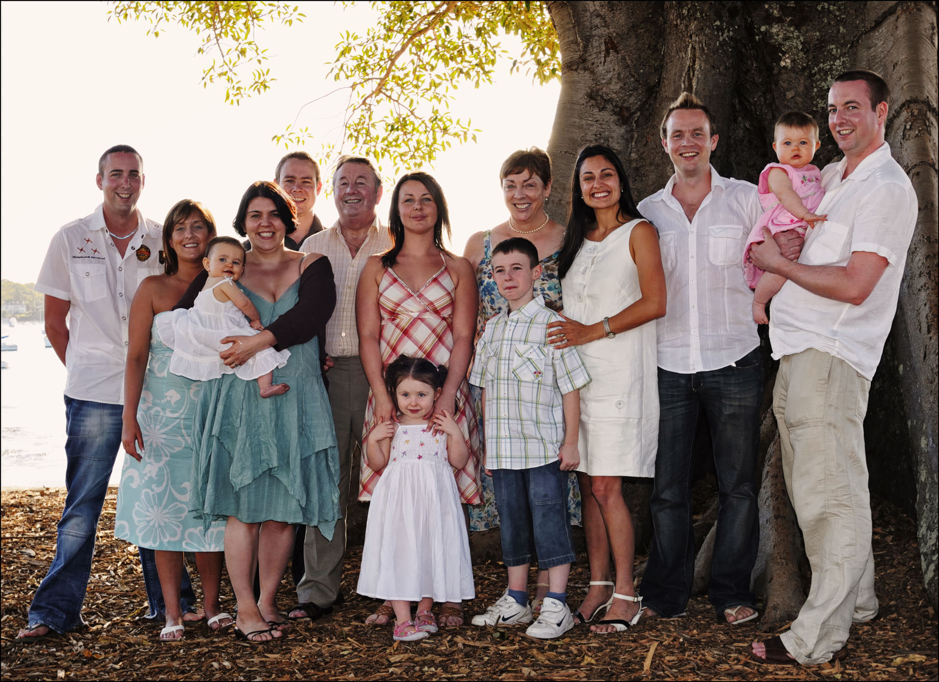 A special extended family gathering and a special portrait to remember the ocassion. Photographed by Kent Johnson.