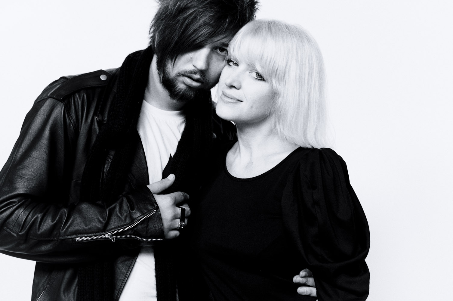 Husband and Wife celebraiting thier life togther with a contemporary studio portrait. Photographed by Kent Johnson. Photographed by Kent Johnson.