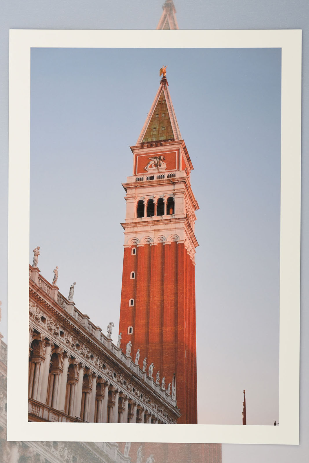 St Mark's Campanile and the Biblioteca Nazionale Marciana in early morning light. La Serenissima an exhibition of photographs by Kent Johnson